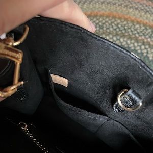 Louis Vuitton hand bag.